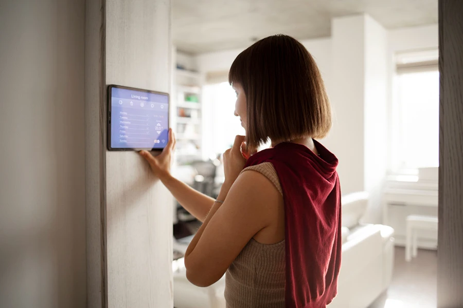 Woman is using Smart Home Technology